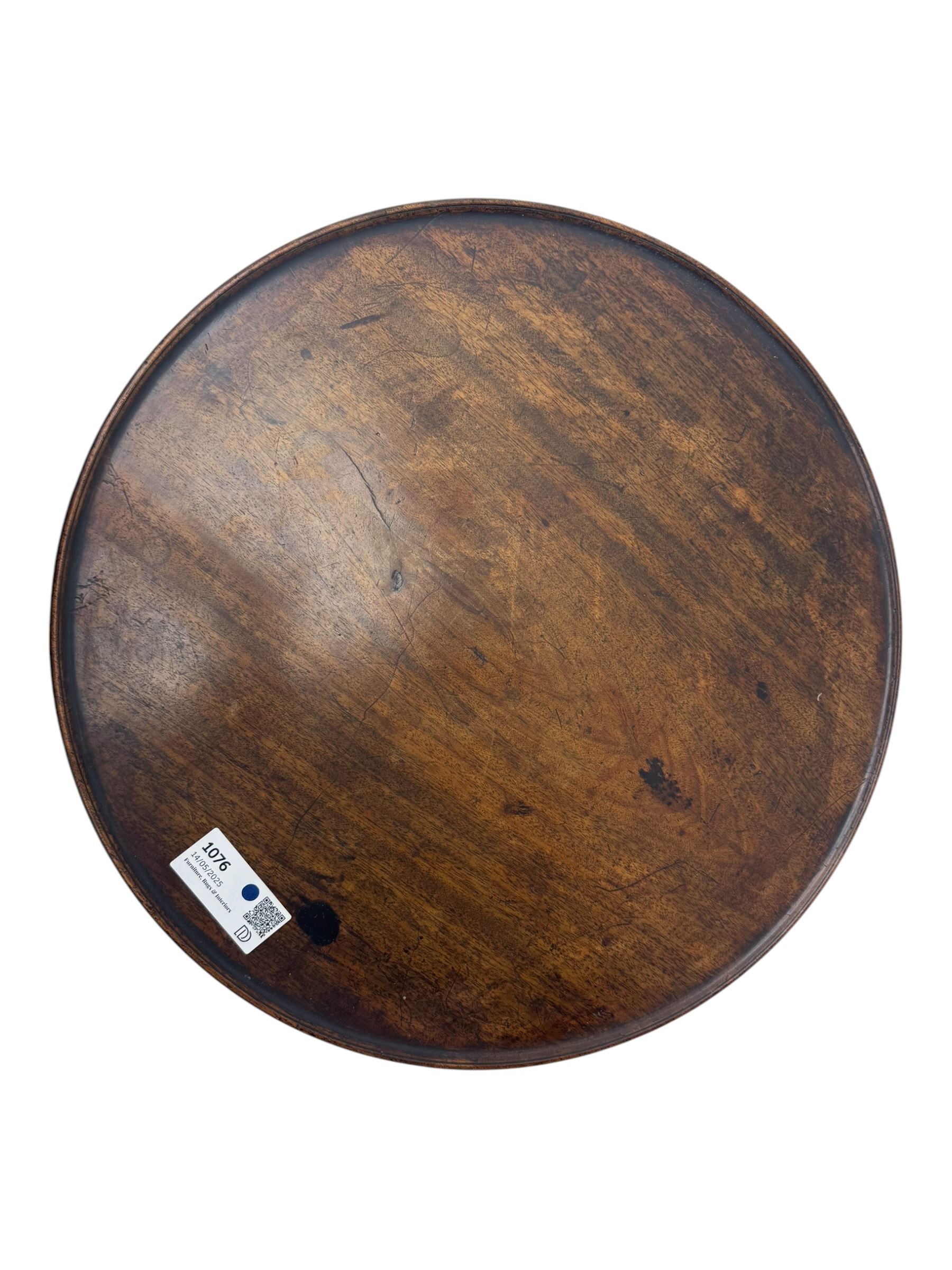 Early 19th century mahogany tripod table, dished top, turned column, cabriole legs on pad feet