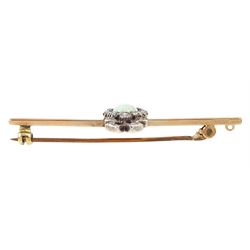 Edwardian gold and silver opal and diamond heart cluster brooch, central oval cut opal surrounded by rose cut diamonds, and surmounted by a diamond set ribbon bow