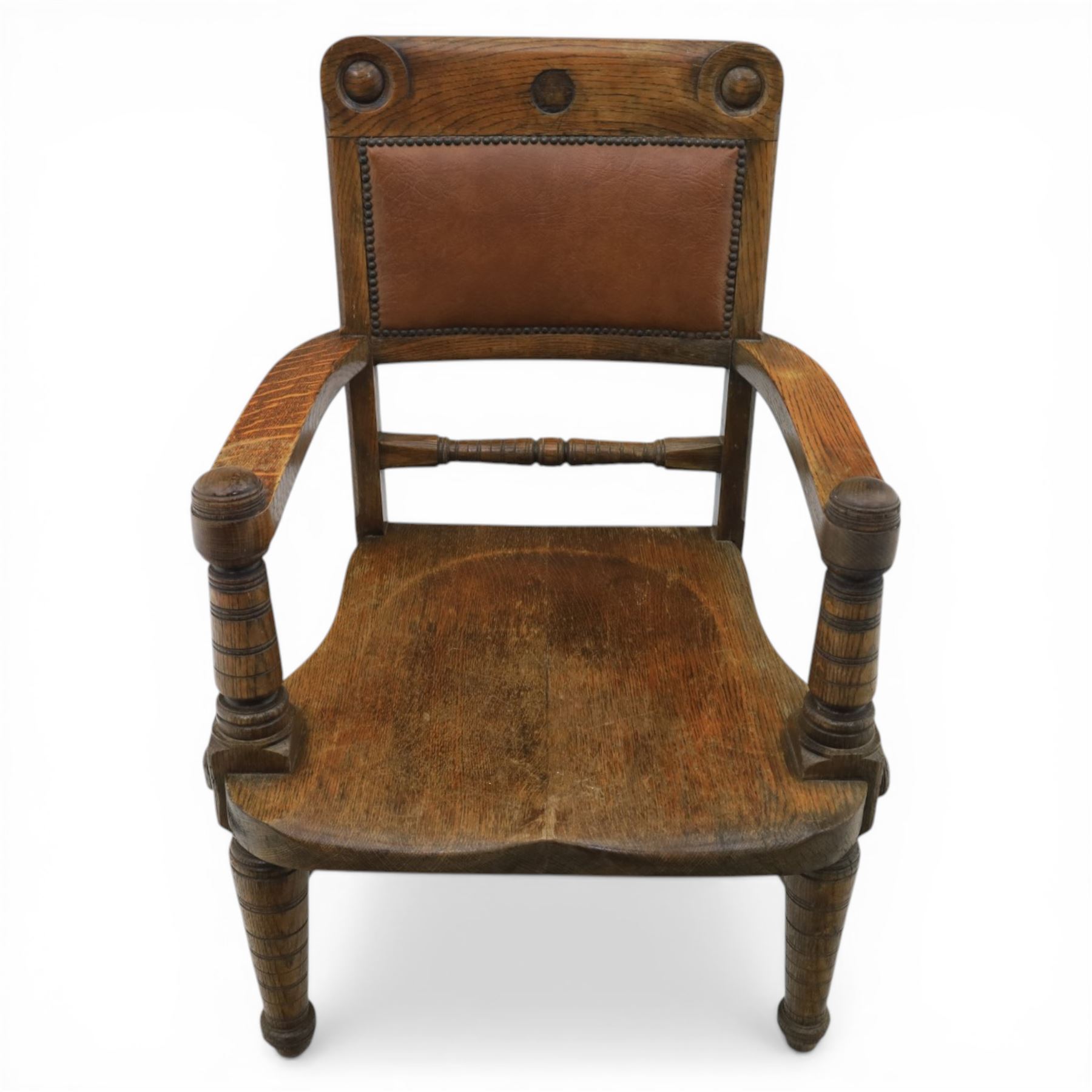 Arts and Crafts oak open armchair with dished seat