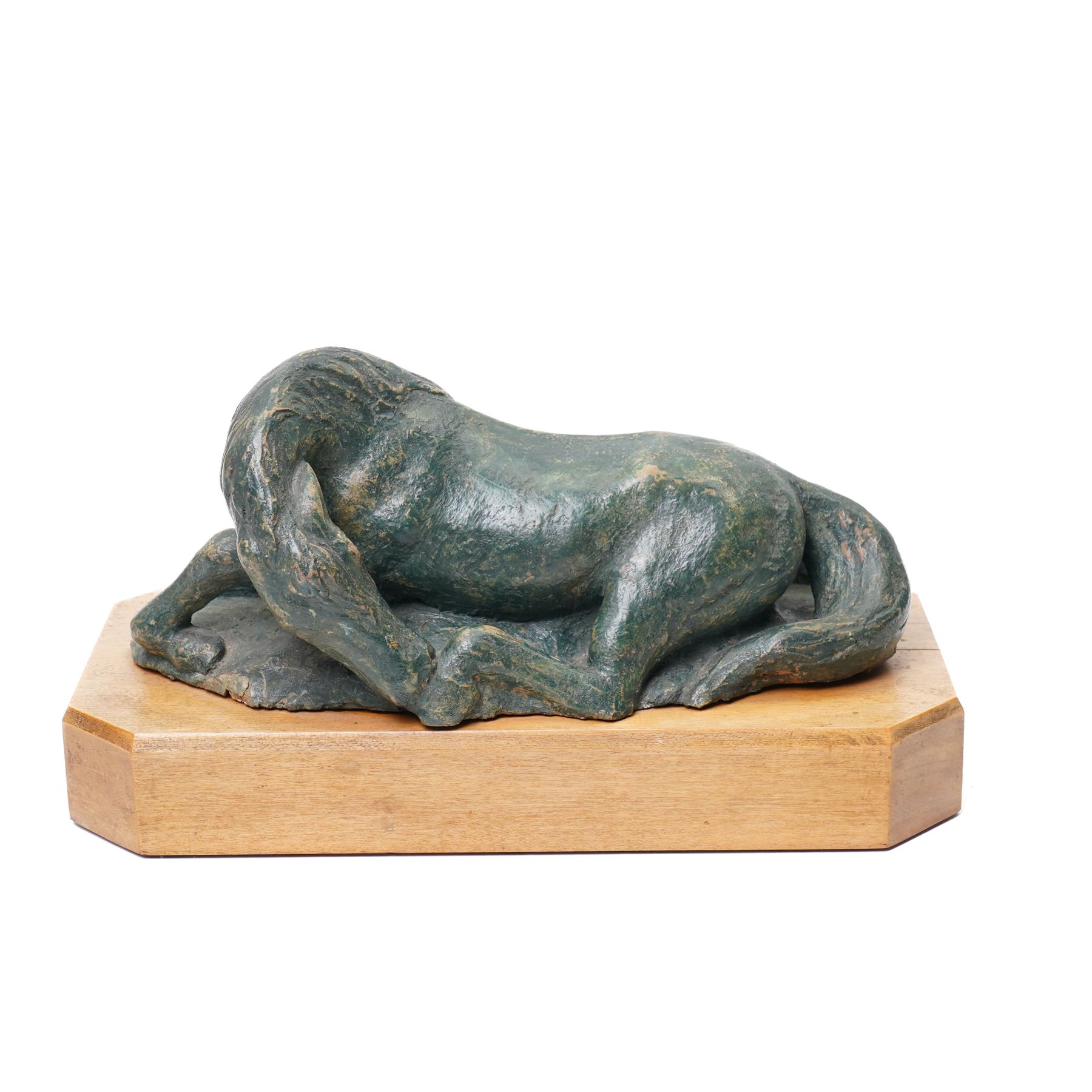 Mid-20th century painted terracotta figure of a recumbent horse, including wooden plinth W31cm