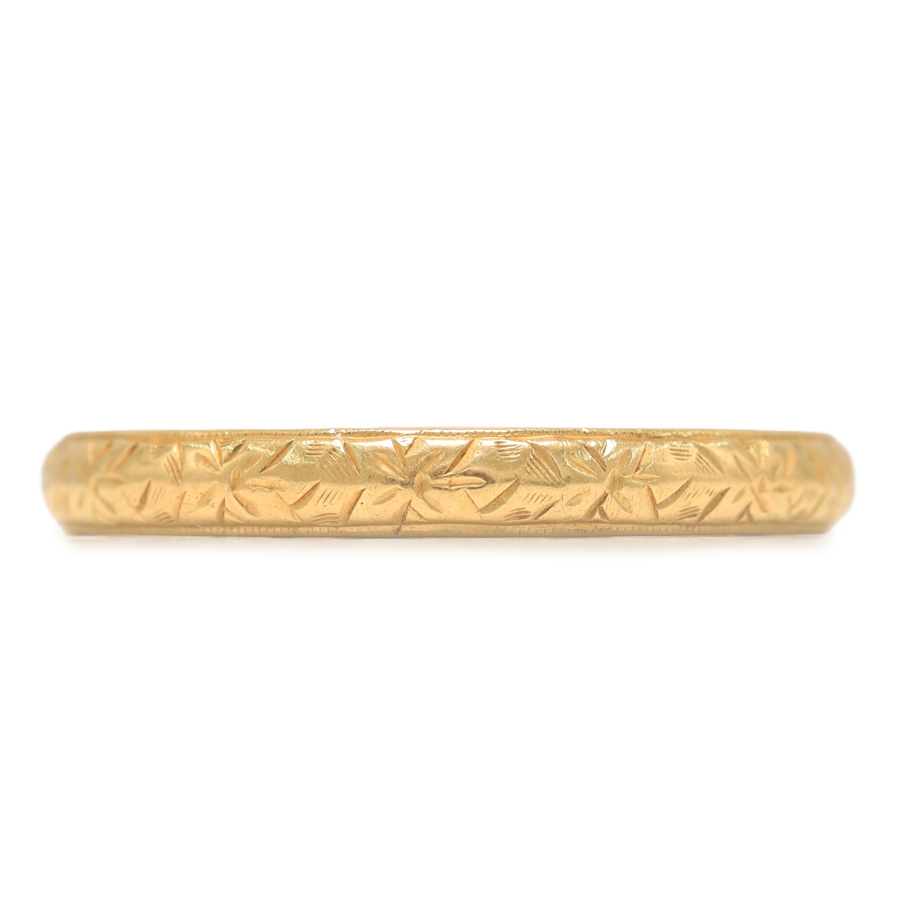 18ct gold wedding band old wedding band, the inside engraved 'Fidelity', the shank with engraved decoration, Chester 1954