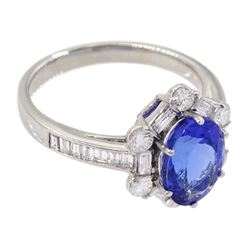 18ct white gold tanzanite and diamond cluster ring, oval tanzanite, with baguette and round brilliant cut diamond surround and baguette cut diamond shoulders, stamped 750, tanzanite approx 1.80 carat, total diamond weight approx 0.55 carat