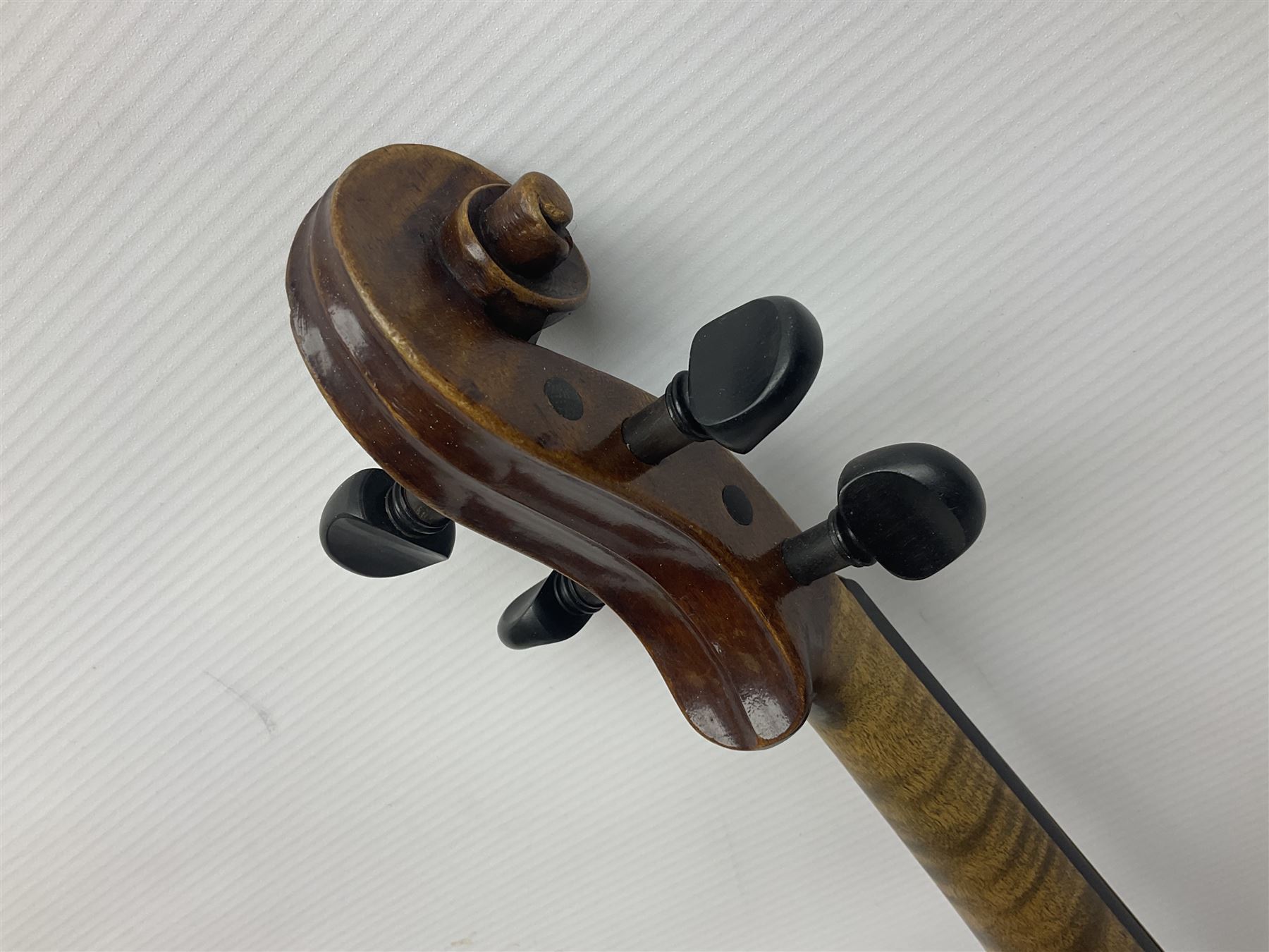 German trade violin in the Steiner style c1900 with 35.5cm two-piece maple back and ribs and spruce top L59cm overall; in fitted carrying case with two bows; and a Saxony violin with 35.5cm one-piece maple back and ribs and spruce top L58.5cm overall (2)