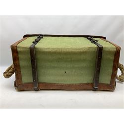 WW2 British Army RAMC 'Regimental Medical Pannier', well marked externally and dated 1941, stamped May 1943 internally, canvas covered wicker form with leather edges, hinged top and fall front with two rope carrying handles, fitted iron locking straps with securing chains; contains various unused field dressings and bandages with WW2 dates and two pillows; original label under lid L79cm