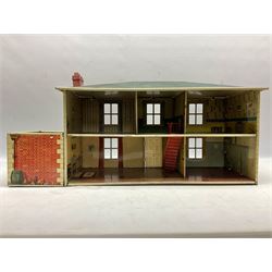Mid-20th century Mettoy tin-plate double-fronted two-storey doll's house, the front elevation with five unglazed windows flanked by green shutters, central opening door, open back giving access to five rooms together with an attached garage, 60cm wide