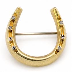 19th / early 20th century diamond horseshoe brooch, set with seven rose cut diamonds