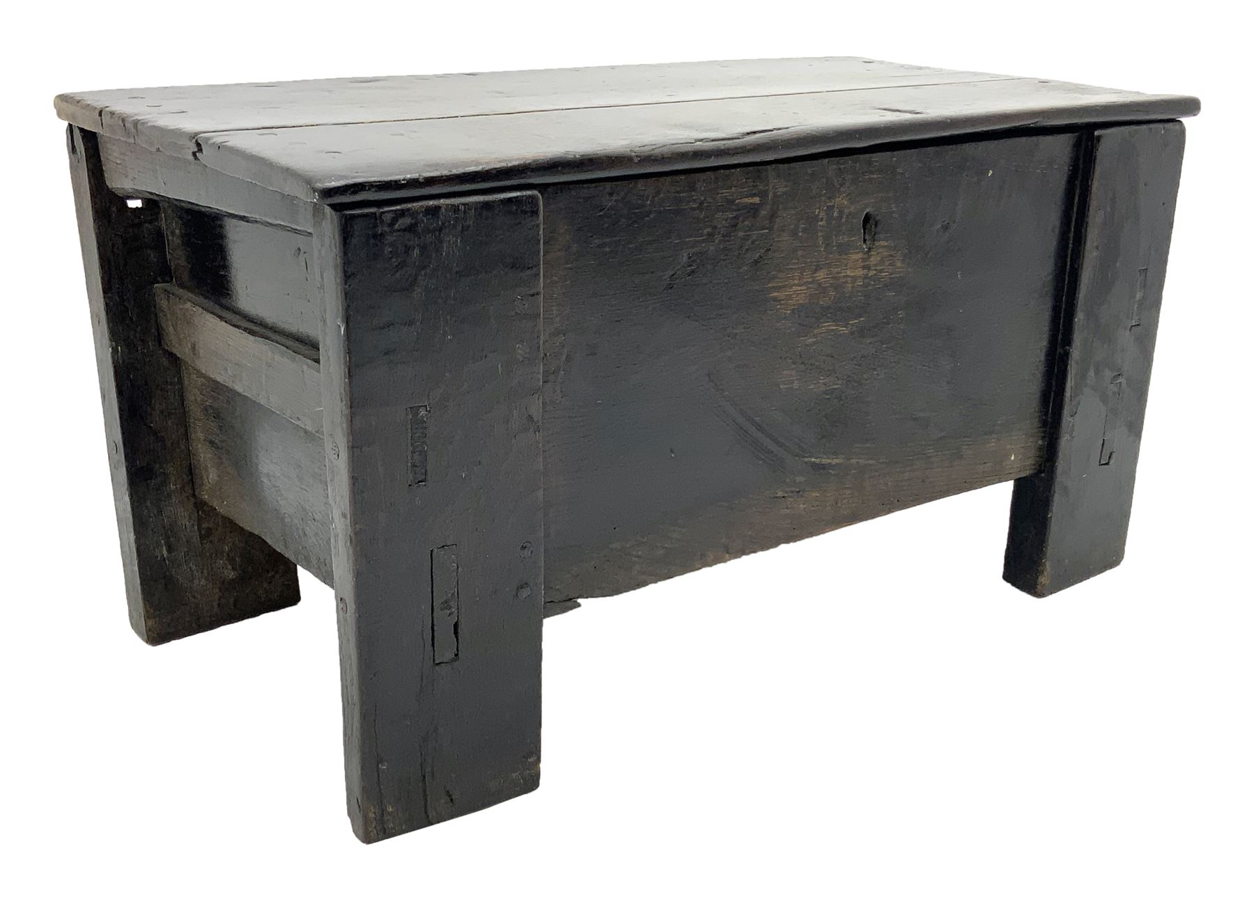 17th century vernacular oak boarded and joined clamp-front coffer or ark chest, enclosed by hinge lid, vertical stile supports