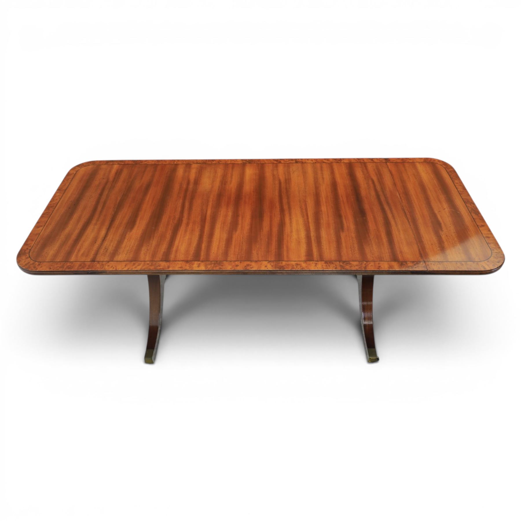 Regency design mahogany drop leaf coffee table, rectangular top crossbanded in walnut, twin pillar legs