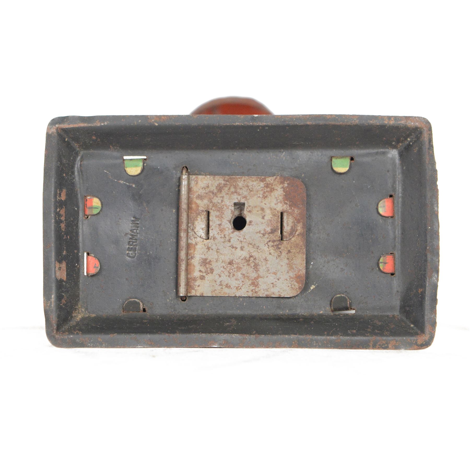 1930s Saalheimer & Strauss Mickey Mouse 'Smile Please' mechanical tin plate money box, depicting Mickey Mouse posing with folded hands to the front and verso as a photographer, above the motto 'If you only pull my ear you will see my tongue appear. Place a coin upon my tongue save your money while you're young', marked to one side 'By exclusive arrangement with Ideal Films Ltd. All rights reserved. Registered No 508041', with key, H17cm

