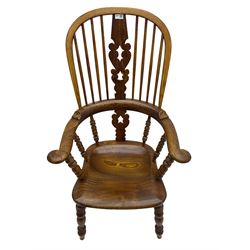 Traditional elm Yorkshire style Windsor armchair, high back with pierced and fret work splat, turned supports joined by double H stretcher