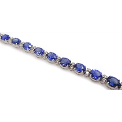18ct white gold oval sapphire and round brilliant cut diamond bracelet, stamped 750, sapphire total weight approx 12.00 carat

[image code: 5mc]