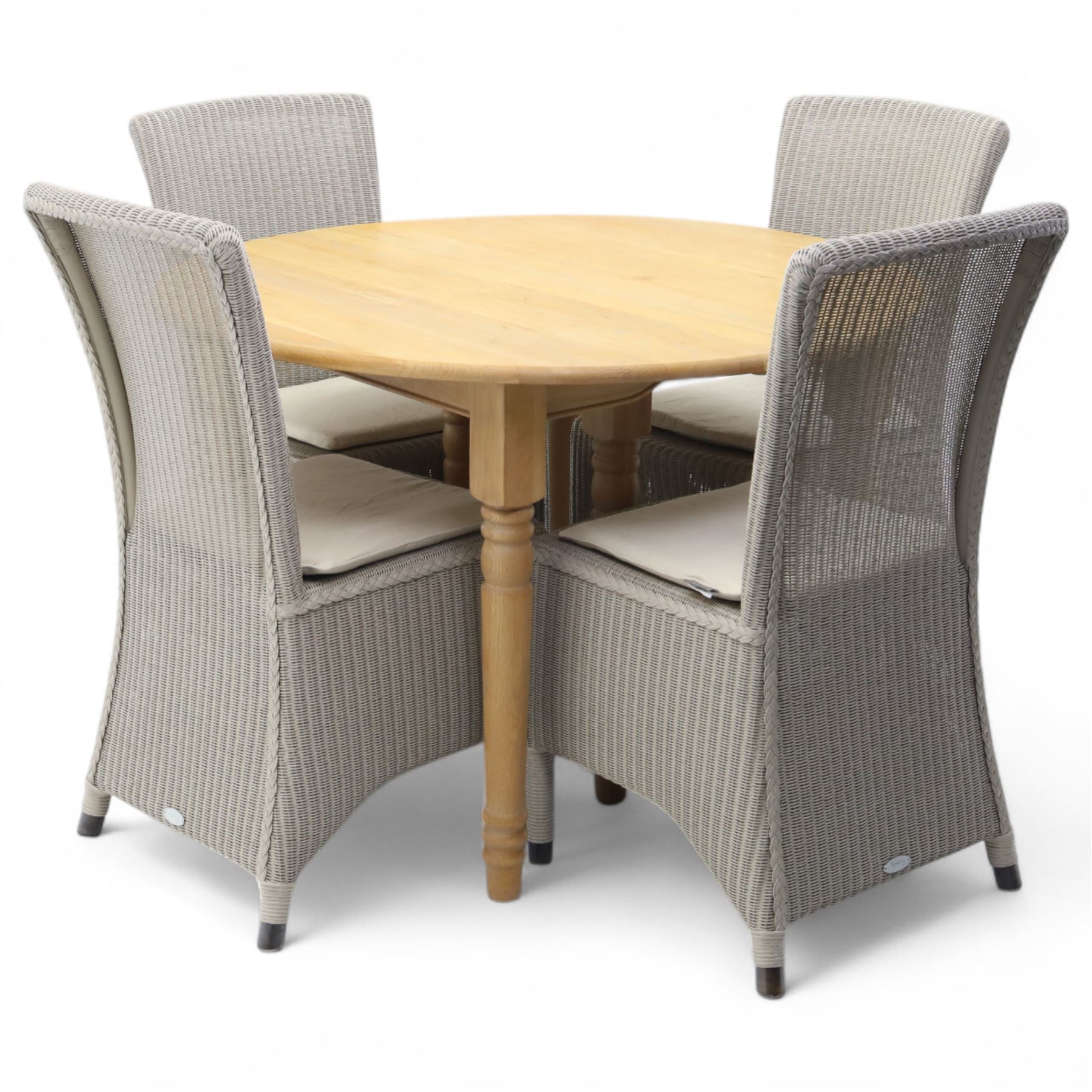 Neptune – Sheldrake limed oak extendable dining table and eight Havan loom chairs, the oval top in limed oak finish with four additional leaves extending the table to seat up to ten (Extends to cm), raised on turned legs with two additional centre supports, the matching Havan loom chairs finished in grey with cream upholstered seat covers (H 95cm, W 47cm, D 55cm)