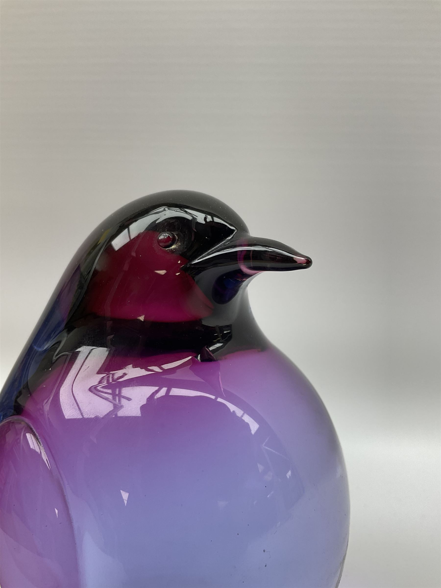 Livio Seguso (Italian, 1930-), Murano glass penguin paperweight in purple and blue, H12.5cm, together with another paperweight modelled as a polar bear for Graglas of Germany, c1970, both with etched marks beneath