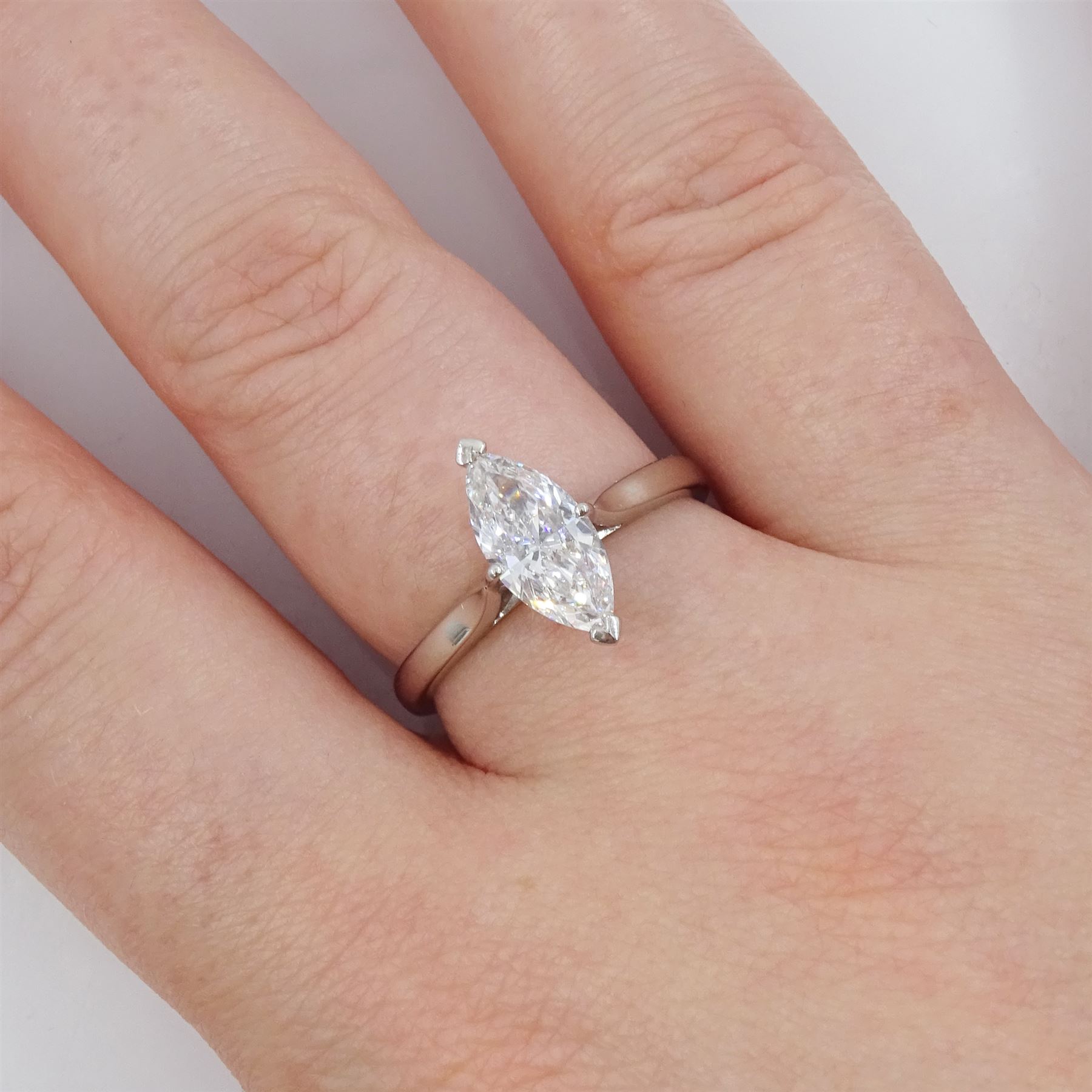 Platinum diamond ring, four claw set with a single marquise cut diamond of 1.01 carat, London 2014, with GIA report