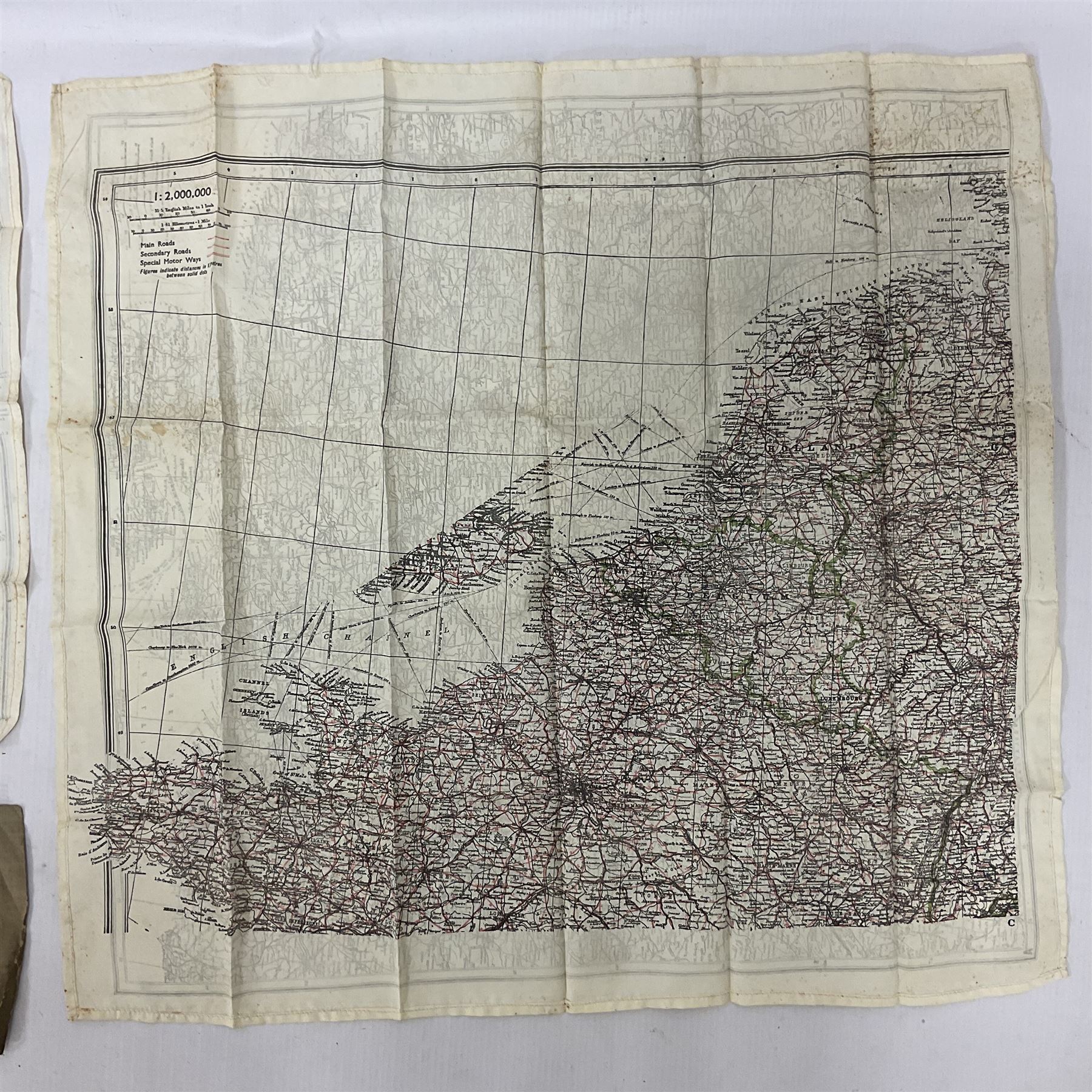 Two WW2 double sided silk escape and evade maps of Europe, comprising: Germany, Belgium, France, Holland, Spain etc,  in canvas envelope stamped Mark II