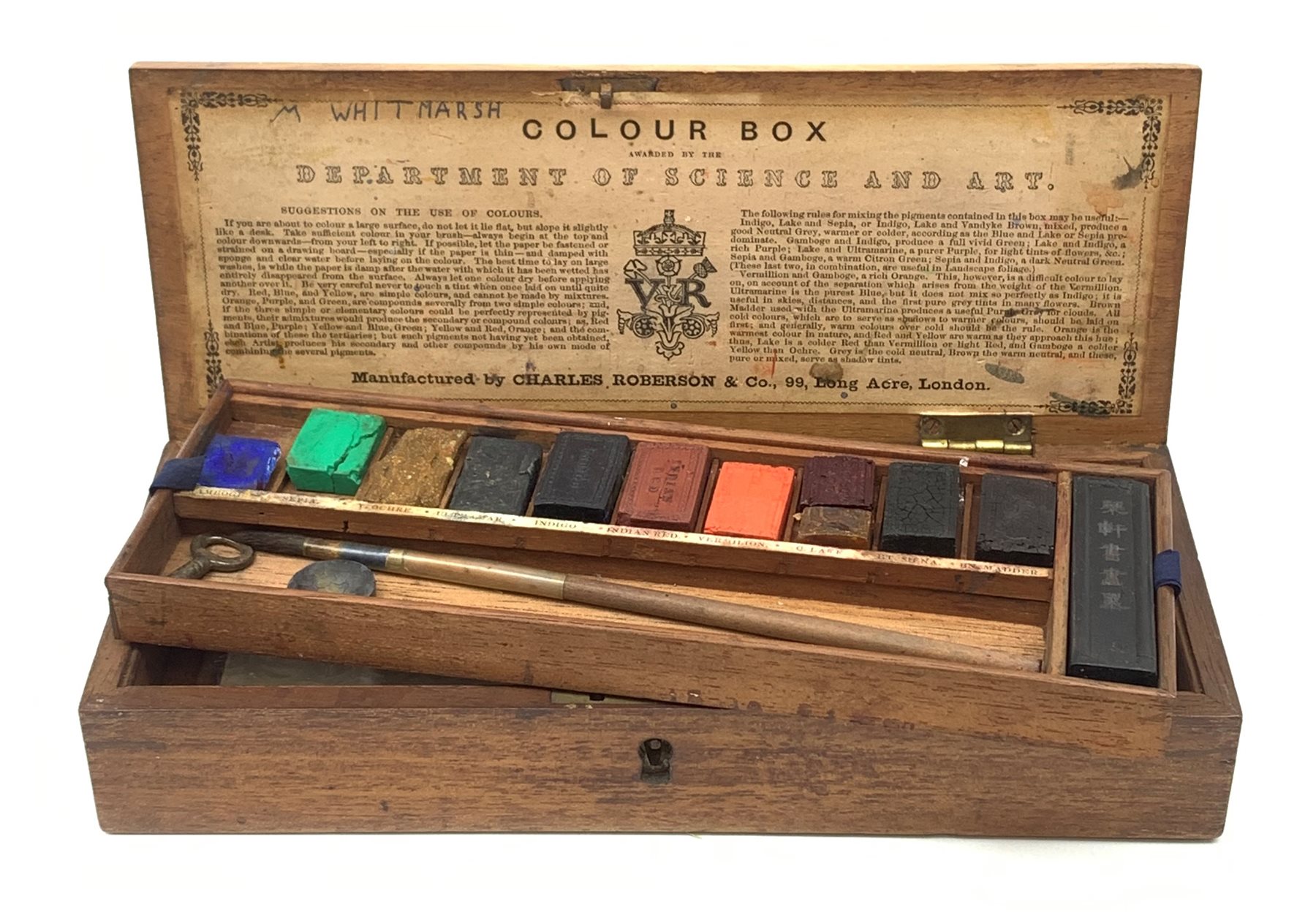 A Victorian mahogany artists paint box by Charles, Roberson & Co, the lid stamped 'Department of Science and Art, L23cm.