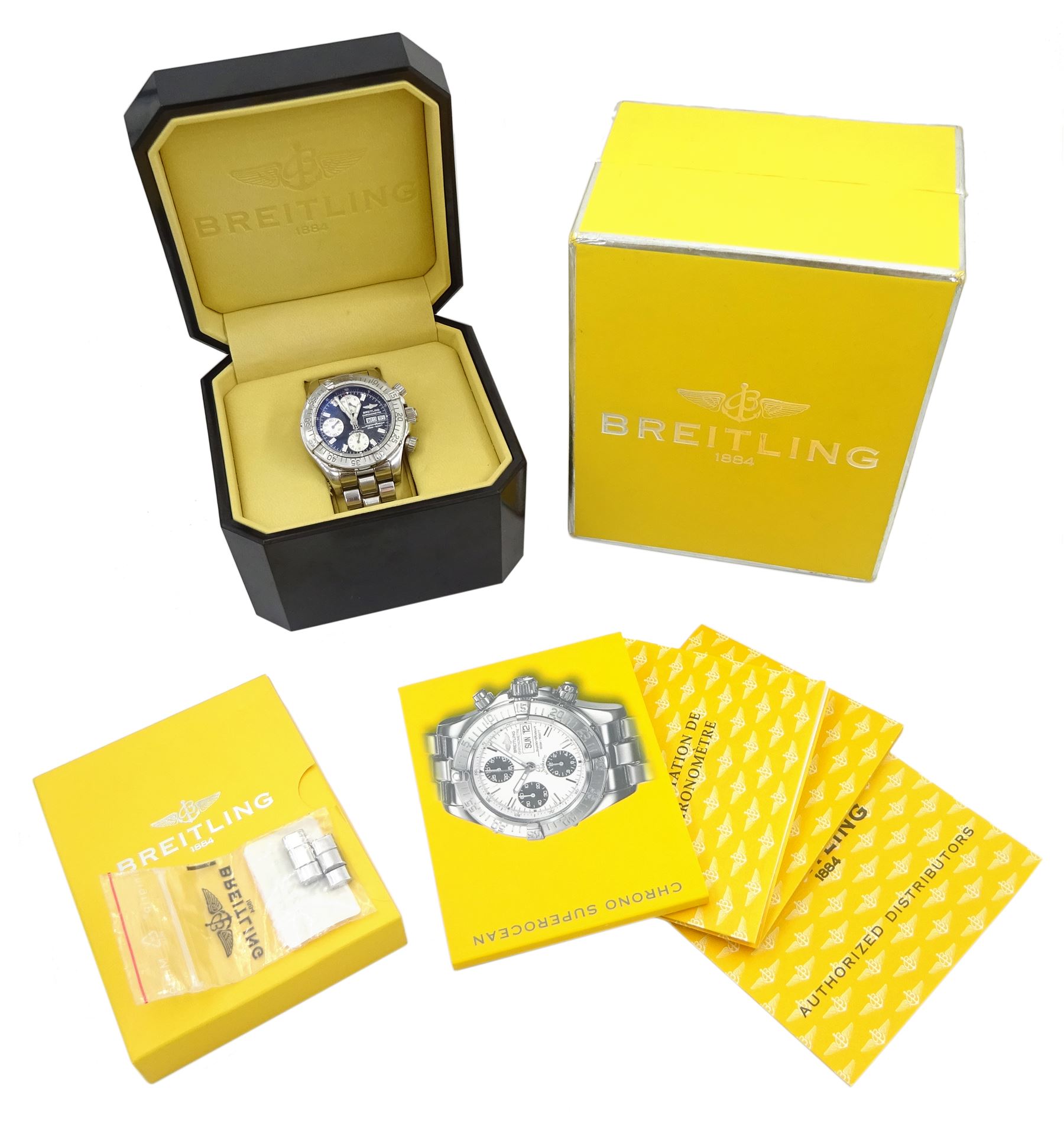 Breitling Superocean gentleman's stainless steel automatic chronograph wristwatch, Ref. A13340, blue dial with triple register recording hours, minutes and continuous seconds and date aperture, boxed with papers and additional links