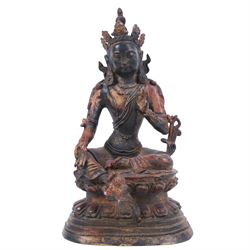 20th century bronzed buddha, with one hand raised, seated upon a lotus leaf, H27cm