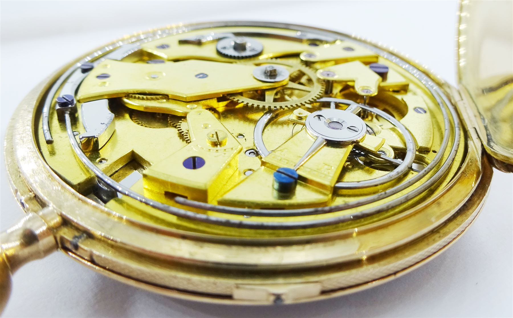 18ct gold open face key wound quarter repeating Swiss lever pocket watch by Garni en Pierre, No. 5090, the gold dust cover inscribed 'Echappement Libre a Ancre', plunge repeat in the pendant, silver engine turned dial with Roman numerals and subsidiary seconds dial