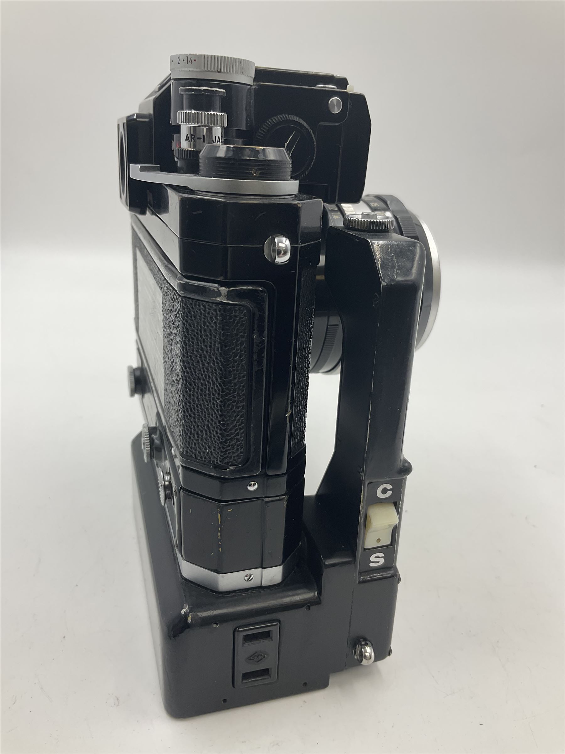 Nikon Photomic TN NKJ camera body, serial no 6728309, circa 1965, with 'Nippon Kogaku NIKKOR-S Auto 1:1.4 f=5.8cm' lens, serial no. 173909, Nikon F36 Motor Drive, serial no.132430 and Nikon cordless battery pack