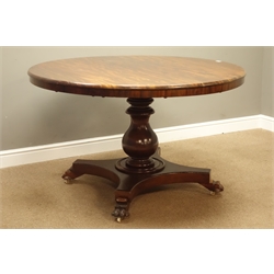  19th century and later mahogany dining table, fixed circular figured top on turned column, platform base with carved paw feet, ceramic castors, D131cm, H77cm  