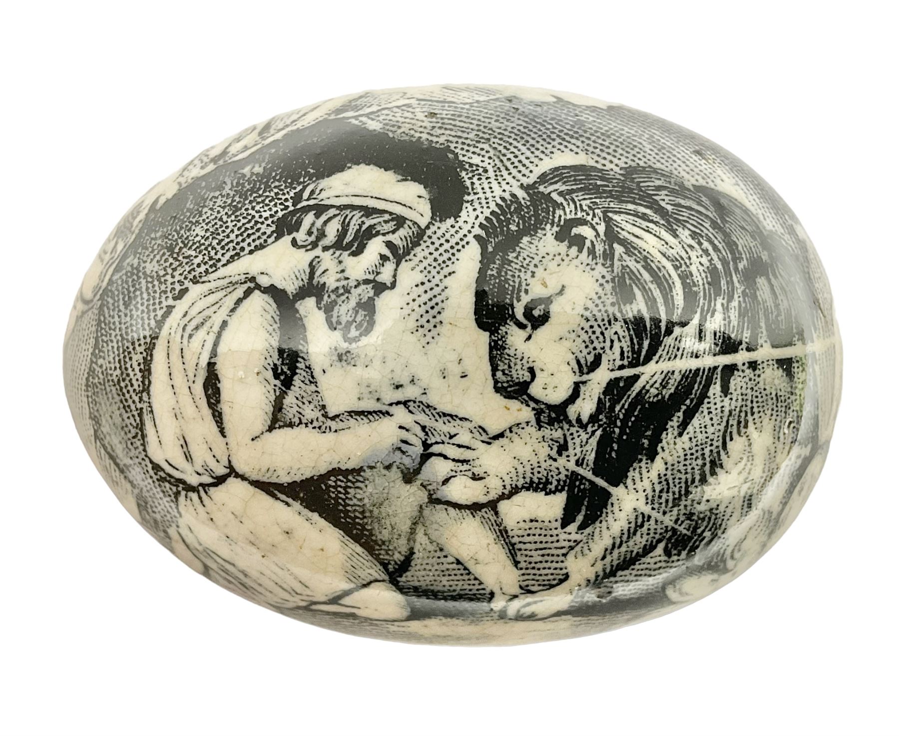 Victorian pottery egg transfer, printed with scenes 'Androcles and the lion' and a courting couple, L7cm 