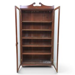 Edwardian walnut bookcase, fitted with two full height glazed doors, inlaid detail with checkered motif, adjustable shelves