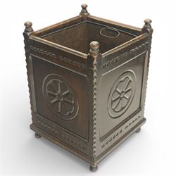 20th century carved fireside accessories; a carved coal bucket with metal liner and a carved fire screen