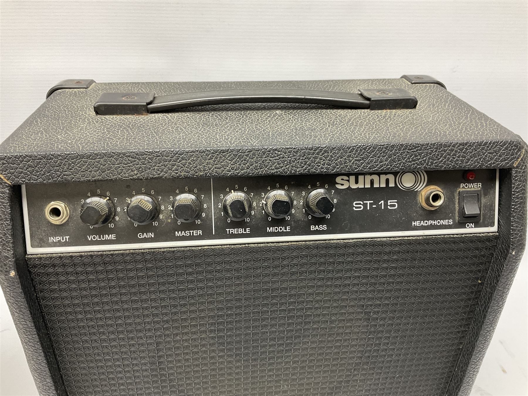 Westfield sunburst Les Paul style six-string electric guitar with ivory coloured trim L101cm; with Sunn ST-15 amplifier, serial no.VK-112435 (2)