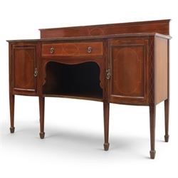 Edwardian mahogany and satinwood sideboard, shaped top with galleried back, with freize drawer flanked by two cabinets, united by undertier, raised on square tapering supports terminating in spade feet