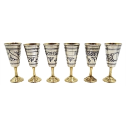  Set of six Russian niello silver and parcel gilt vodka cups, stamped 5KXK, approx 7.5oz  