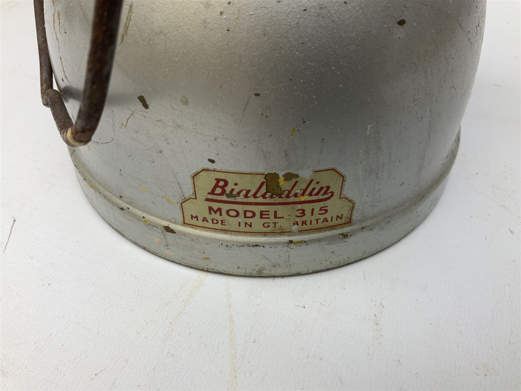 Copper and brass ship’s lamp marked ‘Anchor’, H25cm, Feuer hand storm lantern, Bialaddin Model 315 paraffin lamp and an Anchor lamp (4)