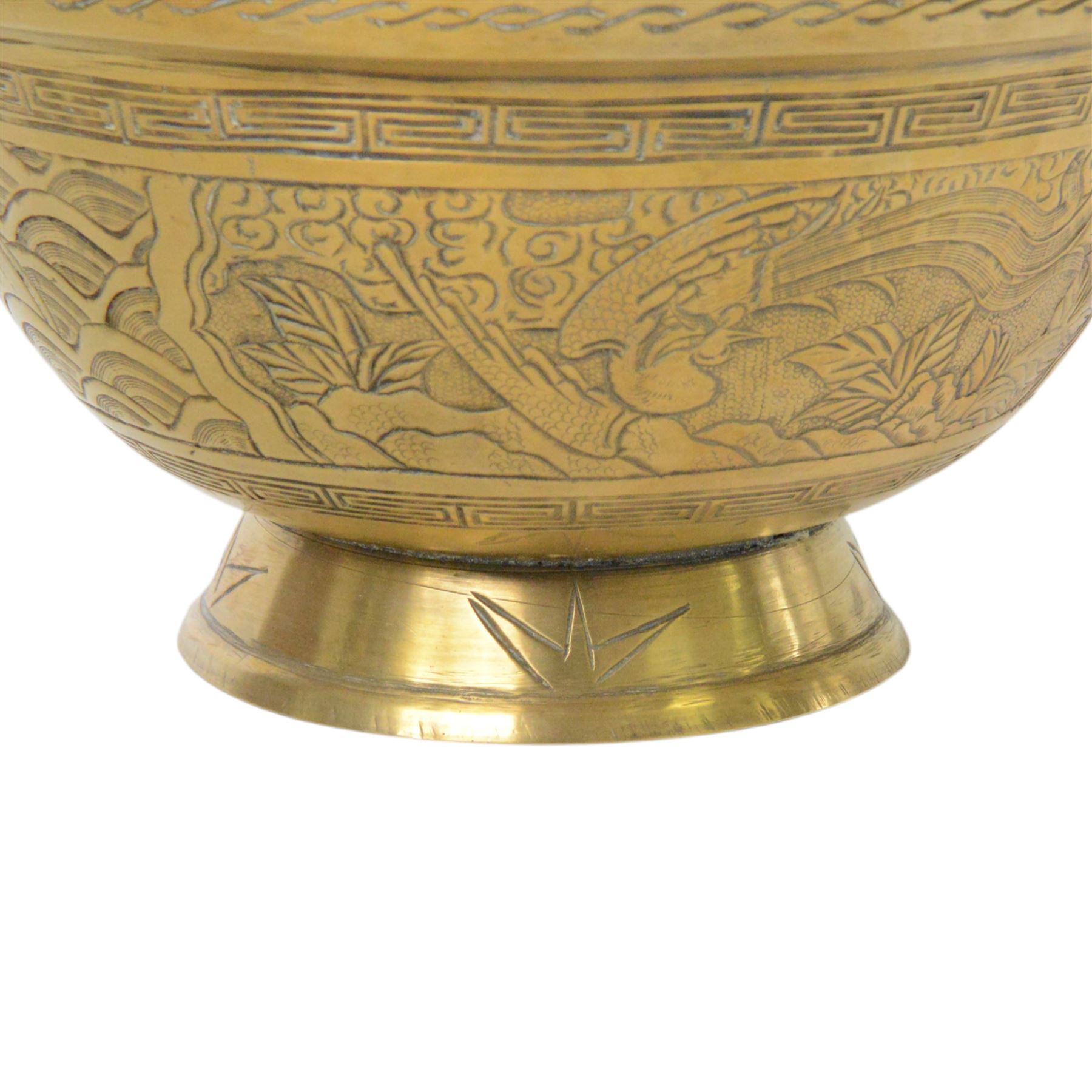Chinese brass bowl, decorated to the outside with dragons,  upon a circular base, cast seal mark to base, D26cm