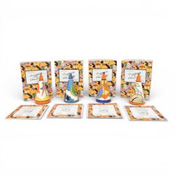 Wedgwood Bizarre by Clarice Cliff, four Conical Sugar shakers, comprising May Avenue, Tree...