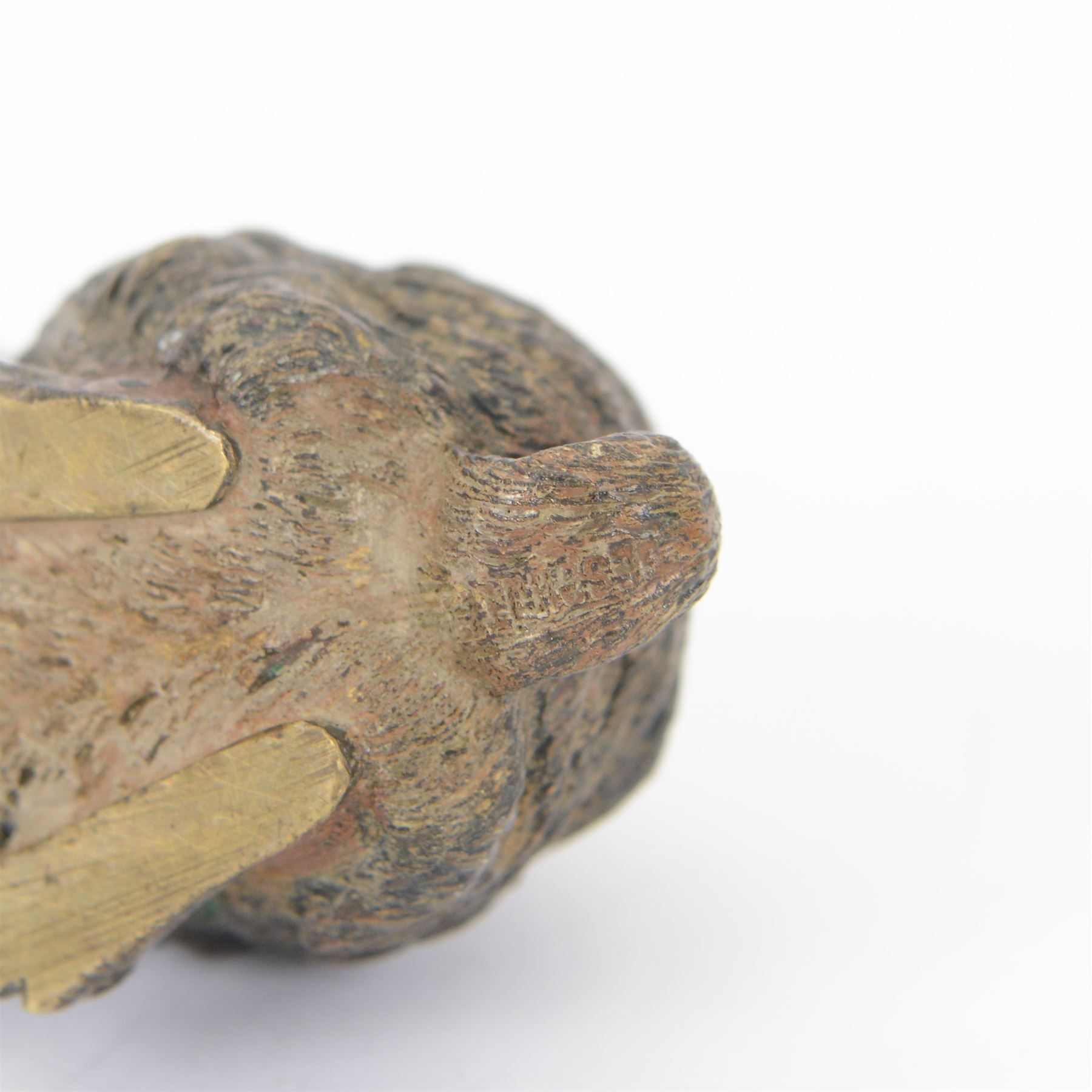 In the manner of Franz Bergman, seated hare, late 19th/early 20th century Austrian cold painted bronze, with indistinct impressed mark beneath, H8cm L9.5cm