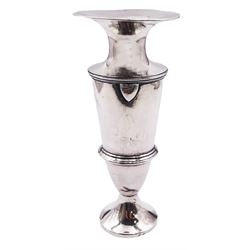 Edwardian silver bud vase, of tapering cylindrical form with girdle, waisted neck and flared rim, upon circular spreading foot, hallmarked George Nathan & Ridley Hayes, Chester 1903, H17cm, approximate weight 4.57 ozt (142.2 grams)