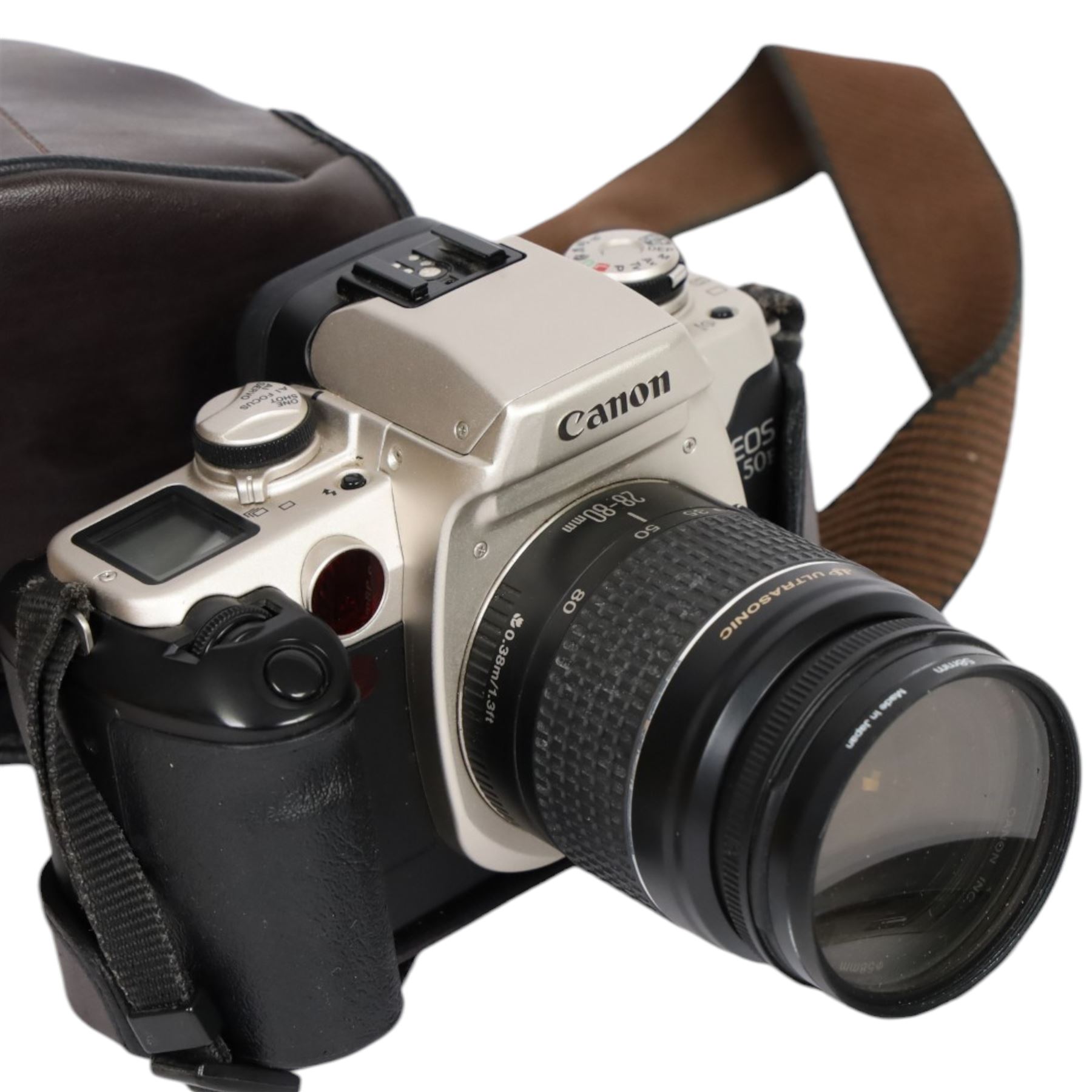 Three 35mm film SLR cameras, comprising Canon EOS 50E camera body with a Canon Ultrasonic EF 28-80mm 1:3.5-5.6 lens, together with a Canon EOS 600 camera body with a Sigma UC 28-70mm 1:3.5-4.5 lens and a Praktica MTL5 with a Carl Zeiss Jena DDR MC Flektogon 2.4/35 lens