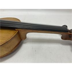 Copy of a full size Stradivarius violin, with an ebonised fingerboard, tailpiece and tuning pegs Length 60cm