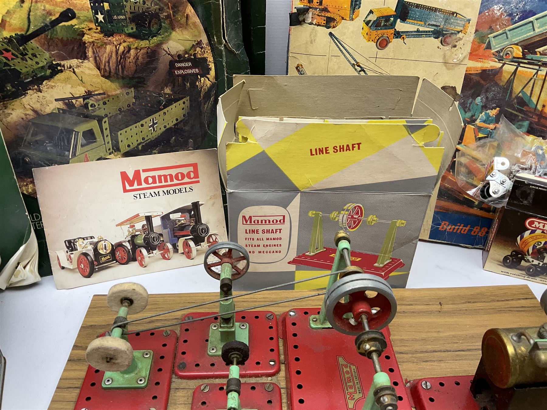 Mamod Minor 1 stationary live steam engine, line shaft, power hammer etc, attached to a wood board, with boxes and a quantity of Meccano 