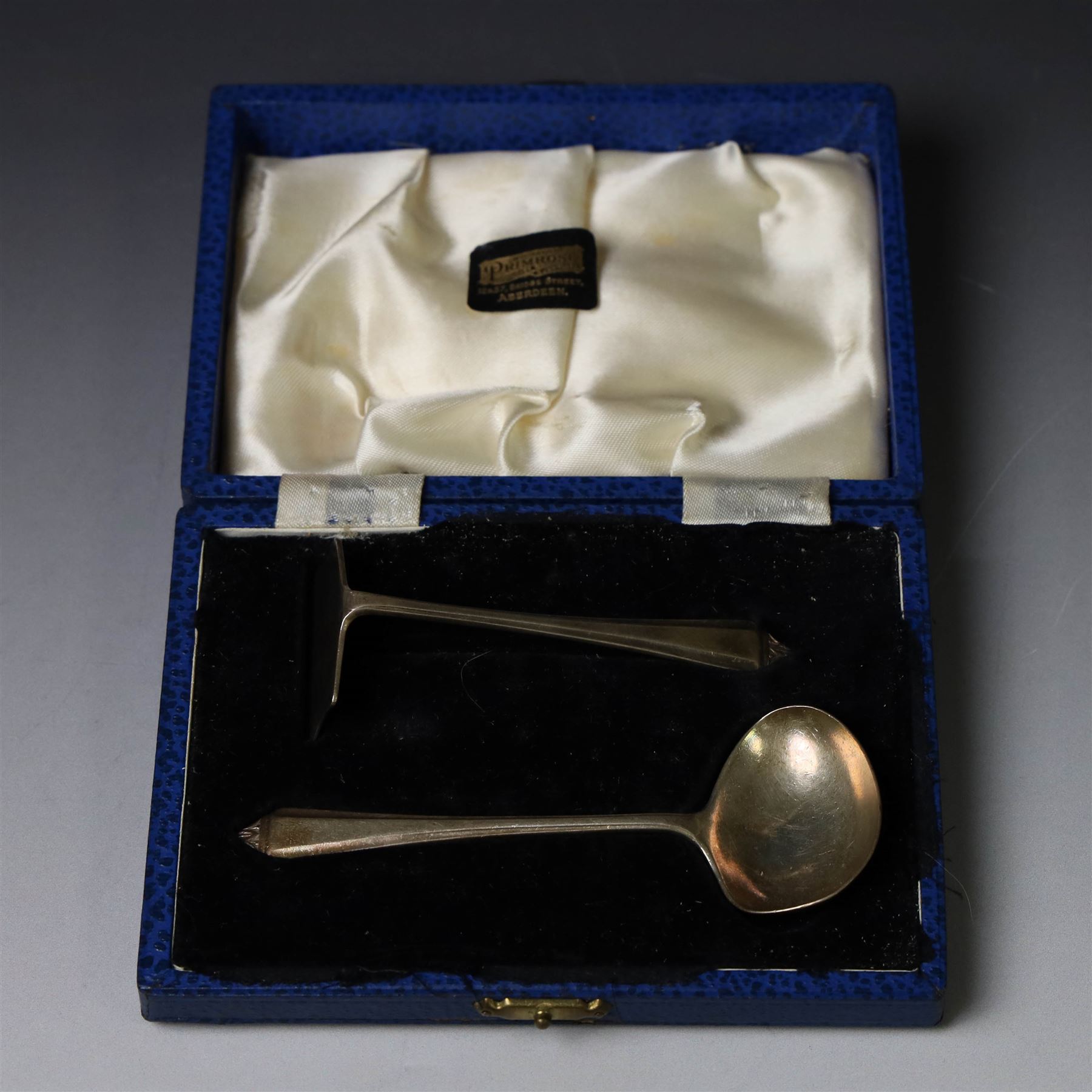 Silver Christening set, comprising spoon, fork and mother of pearl handled knife with engraved initials, together with a silver spoon and pusher set, all hallmarked, in fitted cases