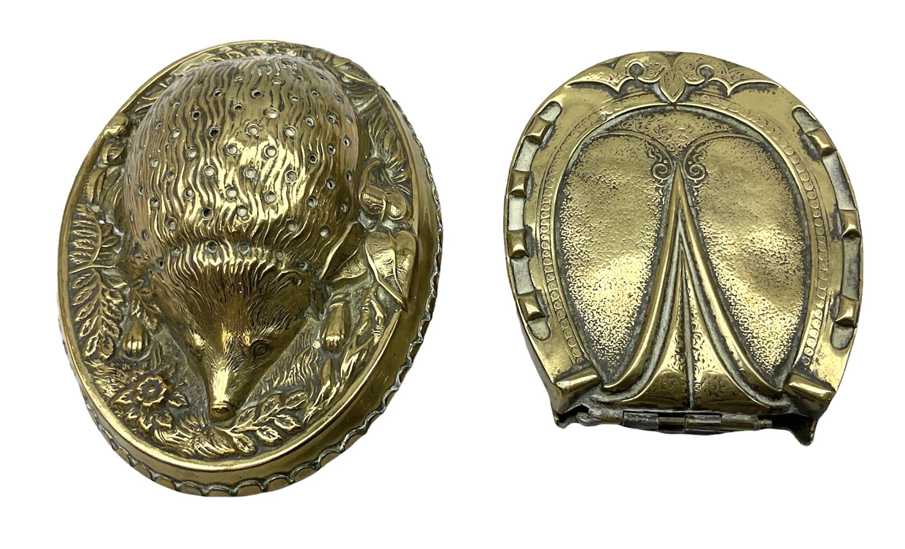 W Avery & Son brass oval pincushion in the form of a hedgehog, and horseshoe needle packet box both inscribed to base 'W. Avery and Son, Redditch', with registration mark, pin cushion L9cm 