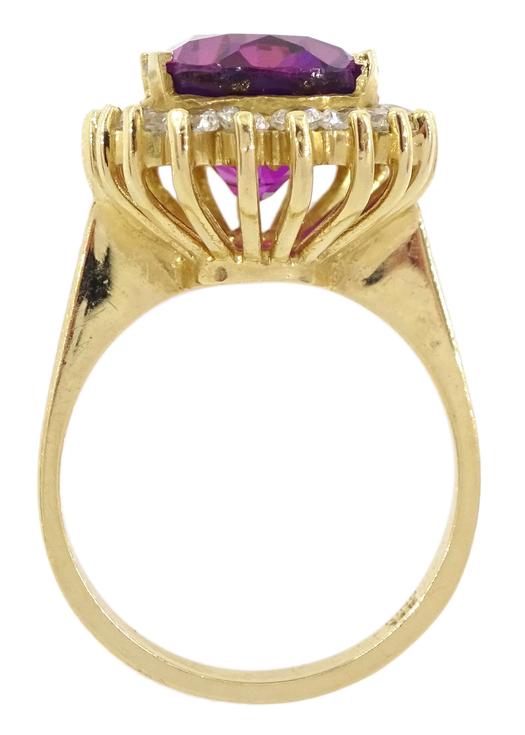 14ct gold synthetic purple sapphire and cubic zirconia cluster ring, stamped 14K