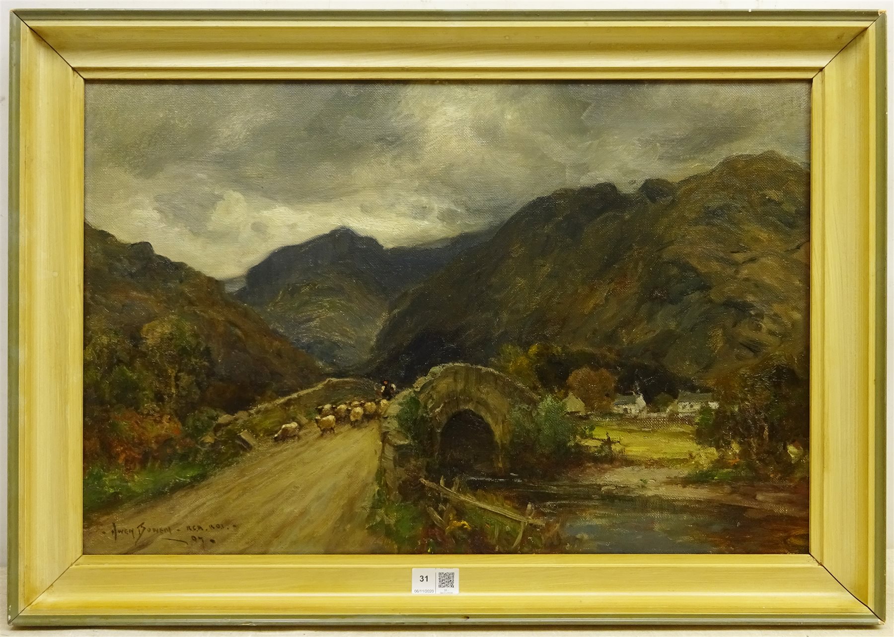 Owen Bowen (Staithes Group 1873-1967): Sheep crossing a Stone Bridge in the Lake District, oil on canvas signed and dated '07, 39cm x 60cm



