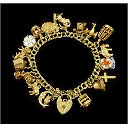 9ct gold curb link charm bracelet, charms including wishing well, bird in cage, lion, elephant and goat, all 9ct