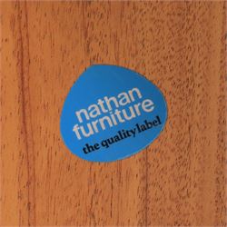 Nathan - teak corner cabinet, the upper section with moulded cornice and two fixed shaped open shelves, above a curved corner cupboard with twin signature square panelled doors, on a shaped plinth