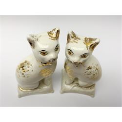 Pair of Victorian Staffordshire cats, modelled seated upon cushions, with gilt detail throughout, H18cm