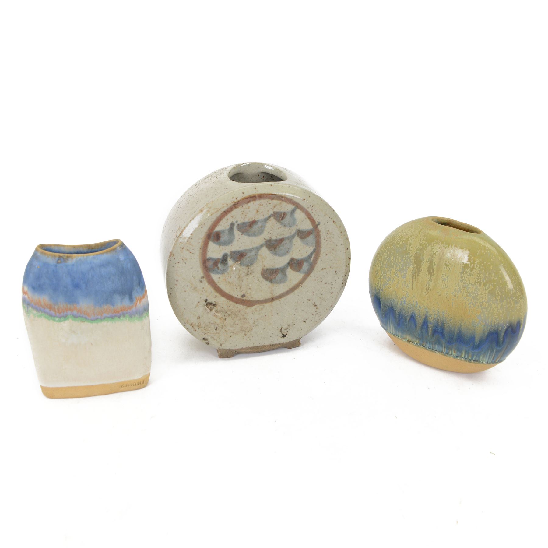Three studio pottery vases, comprising two pieces by Kamini and a larger circular example, tallest H18cm