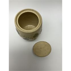 A group of Doulton Lambeth and Royal Doulton tobacco jars, to include examples with relief moulded foliate decoration, each with impressed marks and markers monograms beneath. 