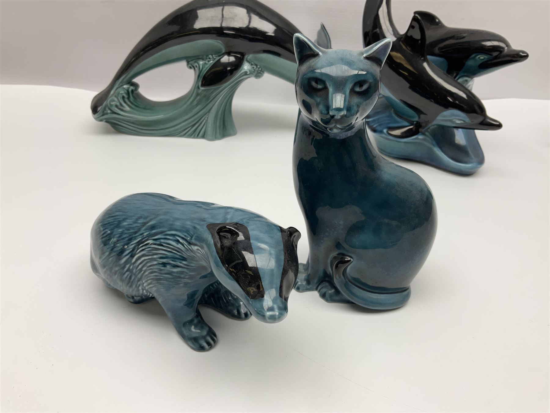 Collection of Poole pottery animals, including frogs, owls, otters, dolphins, mice etc, all with printed mark beneath (23)