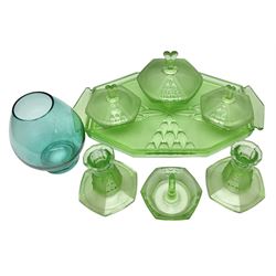 Czech uranium glass dressing table set, comprising twin handled tray, pair of candlesticks, three lidded jars and ring holder dish, and a blue Finnish Riihimäki glass, tray L35cm